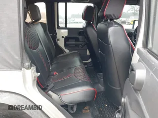 2007 Jeep Wrangler Unlimited X with VIN 1J4GA391X7L107424, listed as a IAAI auction lot 41752013 with 196,557 mi miles and . Bid and sale history available at DreamBid. Image 8.