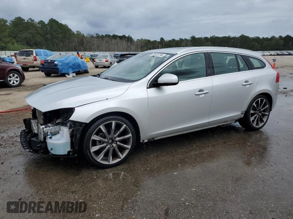 2015 Volvo V60 T5 Drive-E Premier with VIN YV140MEK1F1217329, listed as a Copart auction lot 74323754 with 82,443 mi miles and Salvage Title. Bid and sale history available at carsss.com. Image 1.