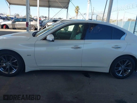 2017 Infiniti Q50 Signature Edition with VIN JN1EV7AP7HM743919, listed as a IAAI auction lot 41664683 with 86,460 mi miles and . Bid and sale history available at DreamBid. Image 14.
