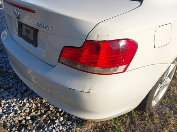 2009 BMW 1 Series 128i SULEV with VIN WBAUP93579VF49106, listed as a IAAI auction lot 41443690 with 1 mi miles. Bid and sale history available at carsss.com. Image 6.