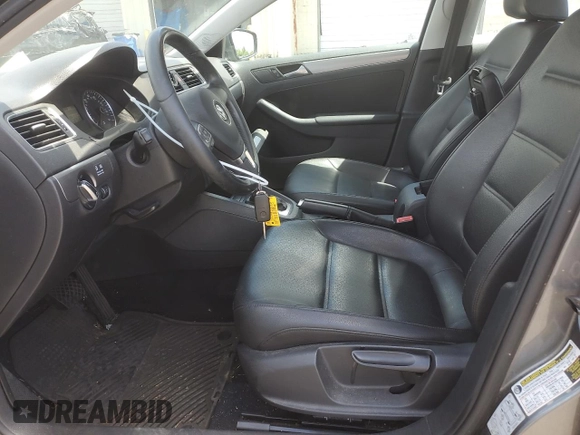 2013 Volkswagen Jetta TDI w/Premium with VIN 3VWLL7AJ3DM205297, listed as a Copart auction lot 56916045 with 157,049 mi miles and Salvage title. Bid and sale history available at DreamBid. Image 7.