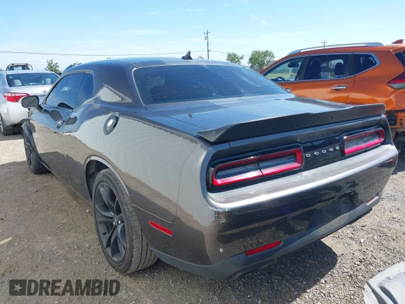 2017 Dodge Challenger R/T Plus with VIN 2C3CDZBT8HH600032, listed as a IAAI auction lot 42173591 with 92,303 mi miles and . Bid and sale history available at DreamBid. Image 3.