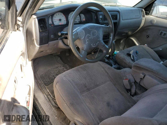 2003 Toyota Tacoma z VIN 5TEVL52N83Z209302, wystawiony jako Copart lot #59814235 z przebiegiem 207 606 mil mil oraz Szkoda całkowita • Salvage title. Historia ofert i sprzedaży dostępna na DreamBid. Obrazek 8.