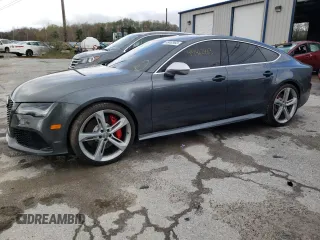 2015 Audi RS 7 z VIN WUAW2CFC5FN900592, wystawiony jako Copart lot #49462463 z przebiegiem 74 694 mil mil oraz . Historia ofert i sprzedaży dostępna na DreamBid. Obrazek 1.