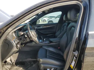 2018 BMW 5 Series 530i with VIN WBAJA5C54JG899845, listed as a Copart auction lot 76386124 with 57,379 mi miles and Salvage Title. Bid and sale history available at DreamBid. Image 7.