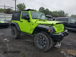 2012 Jeep Wrangler Sport with VIN 1C4AJWAG2CL233722, listed as a Copart auction lot 61125095 with 49,864 mi miles and Salvage title. Bid and sale history available at DreamBid. Image 4.
