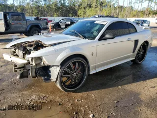 2002 Ford Mustang Standard with VIN 1FAFP404X2F151496, listed as a Copart auction lot 87334454 with Not provided miles and Salvage title. Bid and sale history available at DreamBid. Image 1.