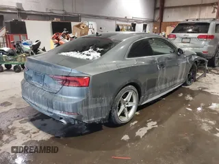 2018 Audi A5 Premium Plus with VIN WAUTNAF50JA011354, listed as a IAAI auction lot 41396659 with 74,936 mi miles and . Bid and sale history available at DreamBid. Image 4.