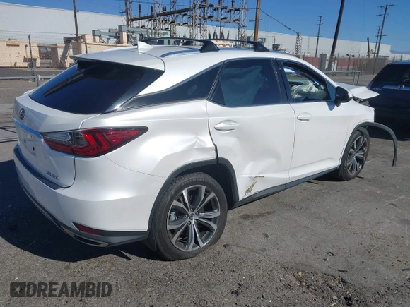 2022 Lexus RX with VIN 2T2HZMAA1NC232512, listed as a IAAI auction lot 41375711 with 27,599 mi miles. Bid and sale history available at carsss.com. Image 4.
