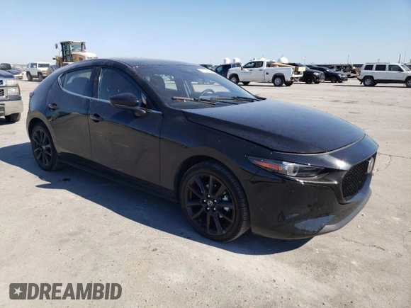 2023 Mazda Mazda3 Hatchback 2.5 S Premium with VIN JM1BPAMM1P1621999, listed as a Copart auction lot 77972854 with 12,411 mi miles and Salvage Title. Bid and sale history available at carsss.com. Image 4.