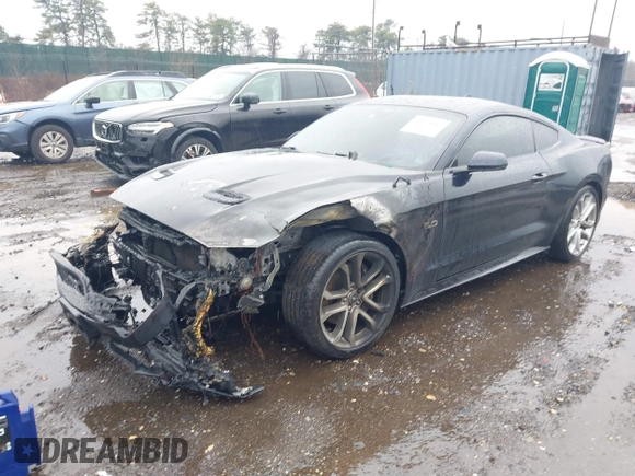 2021 Ford Mustang GT z VIN 1FA6P8CF5M5138913, wystawiony jako IAAI lot #41821447 z przebiegiem 26 365 mil mil oraz . Historia ofert i sprzedaży dostępna na DreamBid. Obrazek 2.