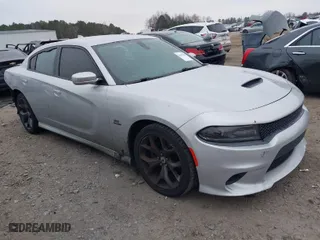 2019 Dodge Charger R/T with VIN 2C3CDXCT2KH605656, listed as a IAAI auction lot 41464186 with 118,254 mi miles. Bid and sale history available at carsss.com. Image 1.