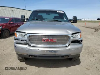 2000 GMC Sierra 2500 SLE z VIN 1GTGK29U1YE324924, wystawiony jako Copart lot #56182795 z przebiegiem 349 358 mil mil oraz Szkoda całkowita • Salvage title. Historia ofert i sprzedaży dostępna na DreamBid. Obrazek 5.