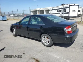 2004 Toyota Camry LE with VIN 4T1BE32K14U318133, listed as a Copart auction lot 54238185 with 293,761 mi miles and Salvage Title. Bid and sale history available at carsss.com. Image 2.