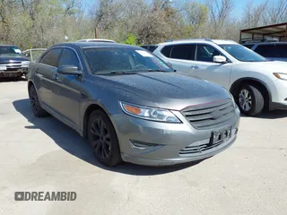 2011 Ford Taurus SEL with VIN 1FAHP2EW4BG183541, listed as a IAAI auction lot 41832302 with 185,085 mi miles. Bid and sale history available at carsss.com. Image 1.