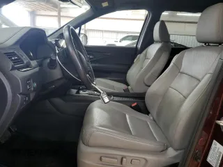 2020 Honda Passport Touring with VIN 5FNYF8H90LB018300, listed as a Copart auction lot 63437595 with 27,740 mi miles and Salvage title. Bid and sale history available at DreamBid. Image 7.