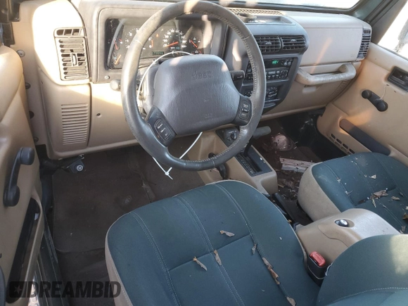 2002 Jeep Wrangler Sahara with VIN 1J4FA59S12P757177, listed as a Copart auction lot 42808925 with 71,049 mi miles and Clean title. Bid and sale history available at DreamBid. Image 8.