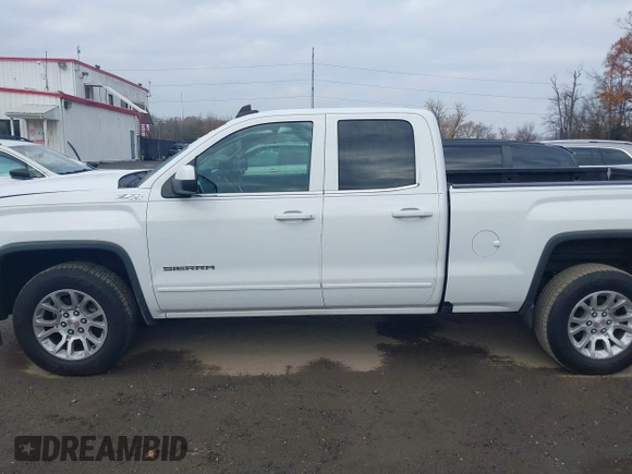 2017 GMC Sierra 1500 SLE z VIN 1GTV2MEC0HZ311932, wystawiony jako IAAI lot #40888769 z przebiegiem 72 676 mil mil oraz . Historia ofert i sprzedaży dostępna na DreamBid. Obrazek 14.
