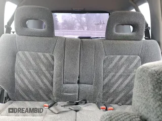 1999 Honda CR-V EX with VIN JHLRD1862XC035063, listed as a Copart auction lot 50295585 with 243,860 mi miles and Salvage Title. Bid and sale history available at carsss.com. Image 10.