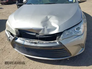 2016 Toyota Camry XLE with VIN 4T4BF1FKXGR519647, listed as a IAAI auction lot 42010266 with 123,595 mi miles and . Bid and sale history available at DreamBid. Image 6.