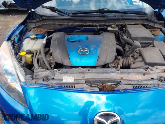 2012 Mazda 3 i Touring z VIN JM1BL1L85C1661934, wystawiony jako IAAI lot #42746228 z przebiegiem 165 386 mil mil oraz . Historia ofert i sprzedaży dostępna na DreamBid. Obrazek 10.