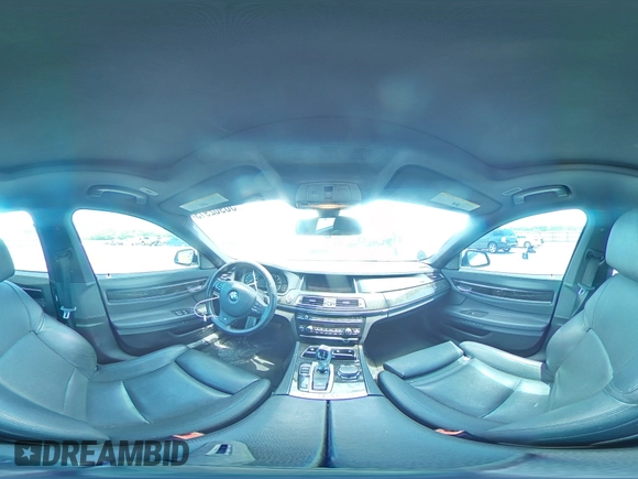 2015 BMW 7 Series 740Li z VIN WBAYE4C5XFD947323, wystawiony jako Copart lot #56962915 z przebiegiem 77 956 mil mil oraz Szkoda całkowita • Salvage title. Historia ofert i sprzedaży dostępna na DreamBid. Obrazek 14.