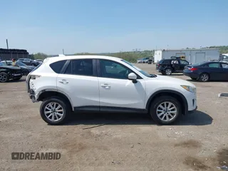 2013 Mazda CX-5 Touring with VIN JM3KE4CE1D0136241, listed as a IAAI auction lot 42119260 with 106,913 mi miles and . Bid and sale history available at carsss.com. Image 13.
