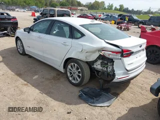 2019 Ford Fusion Hybrid SE with VIN 3FA6P0LU6KR267365, listed as a IAAI auction lot 42030525 with 95,401 mi miles. Bid and sale history available at carsss.com. Image 3.