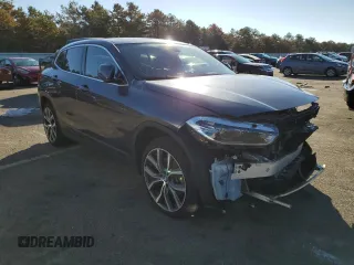 2018 BMW X2 xDrive28i z VIN WBXYJ5C30JEF79472, wystawiony jako Copart lot #65888442 z przebiegiem 60 941 mil mil oraz . Historia ofert i sprzedaży dostępna na DreamBid. Obrazek 1.