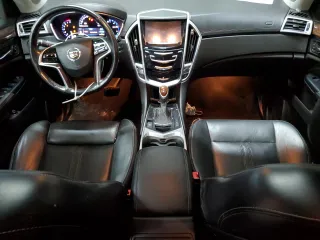 2014 Cadillac SRX Performance Collection z VIN 3GYFNFE31ES627978, wystawiony jako Copart lot #55437185 z przebiegiem 141 759 mil mil oraz Czysty tytuł • Clean title. Historia ofert i sprzedaży dostępna na DreamBid. Obrazek 8.