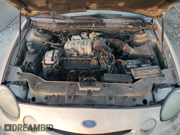 1997 Ford Taurus GL z VIN 1FALP52U9VG142664, wystawiony jako Copart lot #84054224 z przebiegiem 151 610 mil mil oraz Czysty tytuł • Clean title. Historia ofert i sprzedaży dostępna na DreamBid. Obrazek 11.