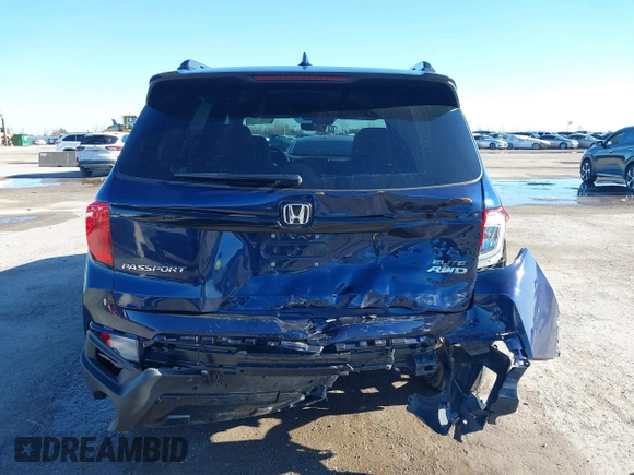 2023 Honda Passport Elite with VIN 5FNYF8H06PB012234, listed as a IAAI auction lot 41208146 with 38,491 mi miles and . Bid and sale history available at DreamBid. Image 16.