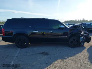 2008 Chevrolet Suburban LTZ with VIN 3GNFC16Y78G211215, listed as a IAAI auction lot 41250412 with 1 mi miles. Bid and sale history available at carsss.com. Image 13.