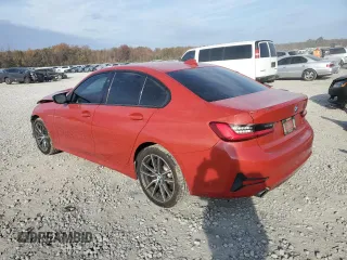 2019 BMW 3 Series 330i xDrive with VIN WBA5R7C51KAJ82278, listed as a Copart auction lot 82415124 with 57,625 mi miles and Salvage Title. Bid and sale history available at carsss.com. Image 2.