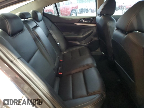 2016 Nissan Maxima SL with VIN 1N4AA6AP7GC387273, listed as a Copart auction lot 54103765 with 133,337 mi miles and Salvage Title. Bid and sale history available at DreamBid. Image 10.