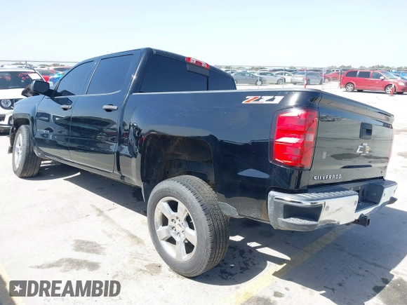 2014 Chevrolet Silverado 1500 LT with VIN 3GCUKREH8EG210945, listed as a IAAI auction lot 41718435 with 106,320 mi miles and . Bid and sale history available at DreamBid. Image 3.