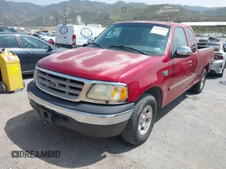 2002 Ford F-150 XL with VIN 1FTRX17LX2NB30978, listed as a IAAI auction lot 41979756 with 225,030 mi miles. Bid and sale history available at carsss.com. Image 2.