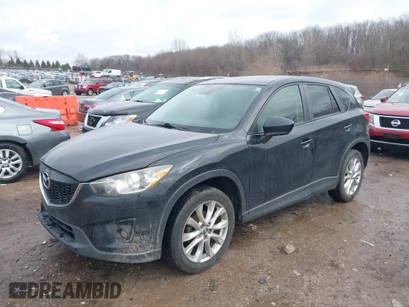 2014 Mazda CX-5 Grand Touring with VIN JM3KE4DY5E0373731, listed as a IAAI auction lot 41517852 with 148,414 mi miles. Bid and sale history available at carsss.com. Image 17.