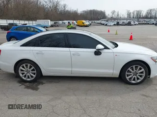 2013 Audi A6 Premium Plus z VIN WAUGGAFC3DN081065, wystawiony jako IAAI lot #41931342 z przebiegiem 136 570 mil mil oraz . Historia ofert i sprzedaży dostępna na DreamBid. Obrazek 13.