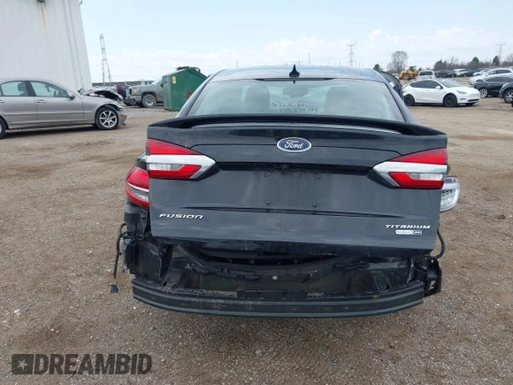 2020 Ford Fusion Titanium with VIN 3FA6P0D9XLR174523, listed as a IAAI auction lot 42100113 with 100,602 mi miles and . Bid and sale history available at DreamBid. Image 17.