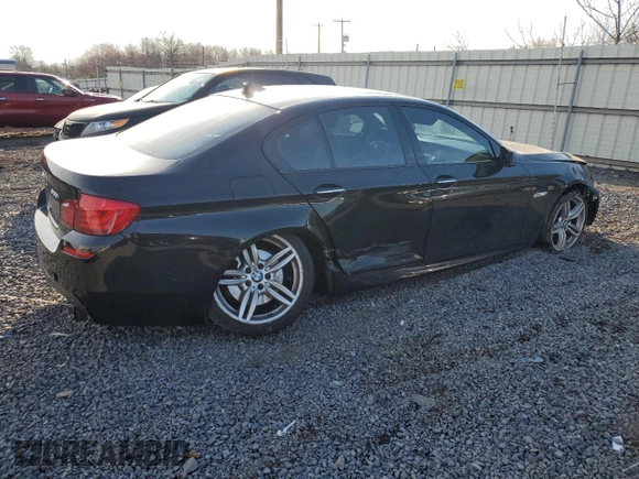 2013 BMW 5 Series 535i xDrive with VIN WBAFU7C54DDU74933, listed as a Copart auction lot 50698855 with 156,112 mi miles and Salvage Title. Bid and sale history available at DreamBid. Image 3.