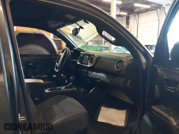2016 Toyota Tacoma SR with VIN 3TMCZ5AN2GM041649, listed as a IAAI auction lot 41758859 with 139,558 mi miles and . Bid and sale history available at DreamBid. Image 5.
