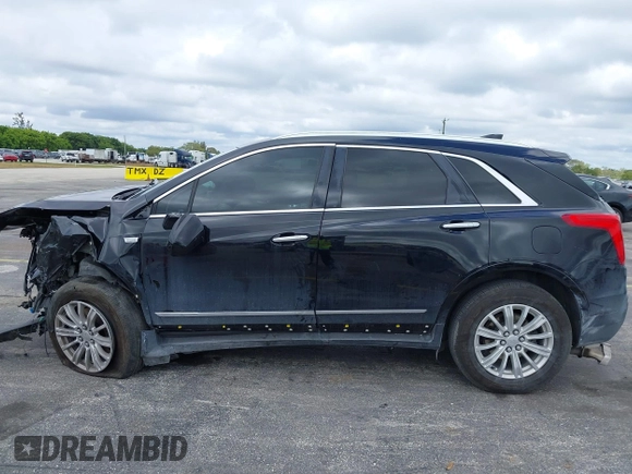 2018 Cadillac XT5 FWD z VIN 1GYKNARS3JZ137039, wystawiony jako IAAI lot #41667581 z przebiegiem 98 281 mil mil oraz . Historia ofert i sprzedaży dostępna na DreamBid. Obrazek 15.