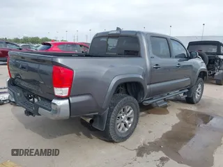2017 Toyota Tacoma SR5 with VIN 5TFAZ5CN4HX047095, listed as a IAAI auction lot 41951364 with 127,706 mi miles and . Bid and sale history available at DreamBid. Image 4.