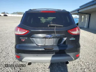 2014 Ford Escape SE with VIN 1FMCU0GX7EUB42975, listed as a Copart auction lot 52605765 with 138,523 mi miles and Salvage Title. Bid and sale history available at DreamBid. Image 6.
