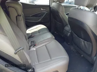 2014 Hyundai Santa Fe with VIN 5XYZUDLB6EG218980, listed as a IAAI auction lot 42391630 with 136,710 mi miles and . Bid and sale history available at DreamBid. Image 8.