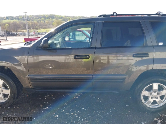 2006 Jeep Grand Cherokee Laredo with VIN 1J4GR48K56C326847, listed as a IAAI auction lot 41972623 with 141,088 mi miles. Bid and sale history available at carsss.com. Image 15.