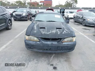 1998 Ford Mustang with VIN 1FAFP4042WF255177, listed as a IAAI auction lot 42421207 with 166,864 mi miles and . Bid and sale history available at DreamBid. Image 6.