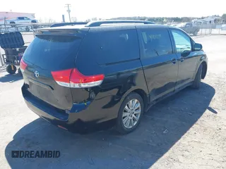 2012 Toyota Sienna XLE with VIN 5TDDK3DC1CS047105, listed as a IAAI auction lot 41901541 with 176,476 mi miles. Bid and sale history available at carsss.com. Image 4.