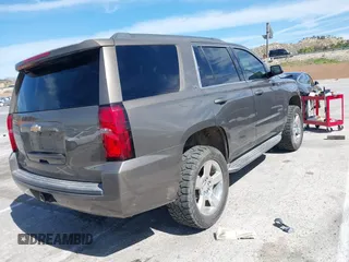 2016 Chevrolet Tahoe LS with VIN 1GNSCAKC7GR419294, listed as a IAAI auction lot 42020006 with 83,945 mi miles and . Bid and sale history available at DreamBid. Image 4.